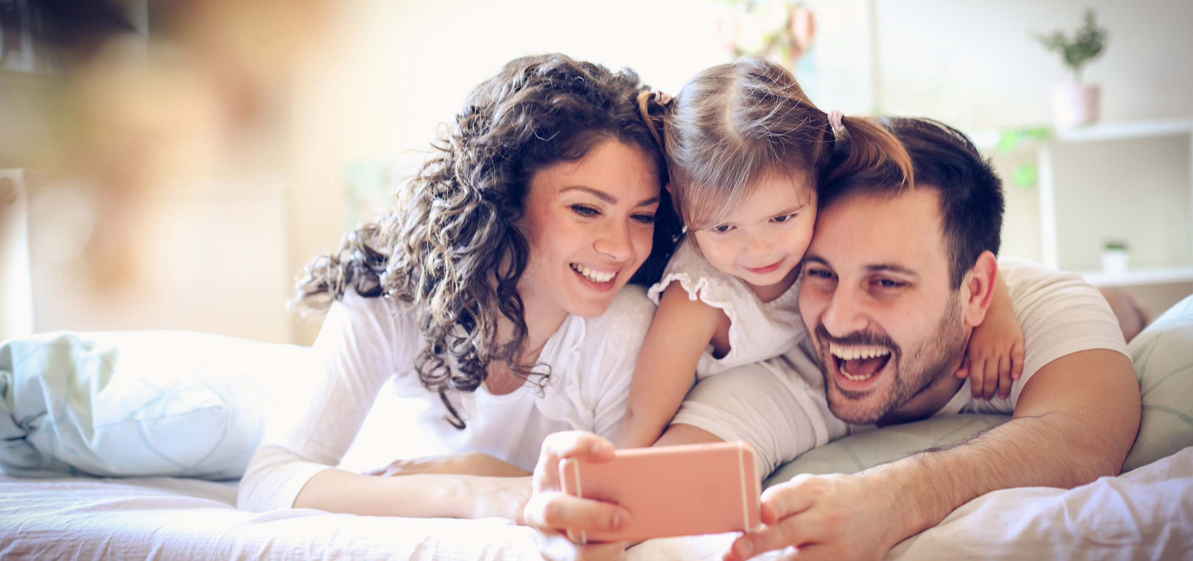  A happy family enjoying the warmth and comfort of their home, representing reliable residential heating oil and HVAC services from Petersburg Oil Company. - petersburgoil.com